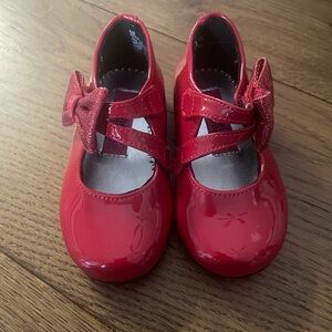 Adorable red patent toddler girl shoes.